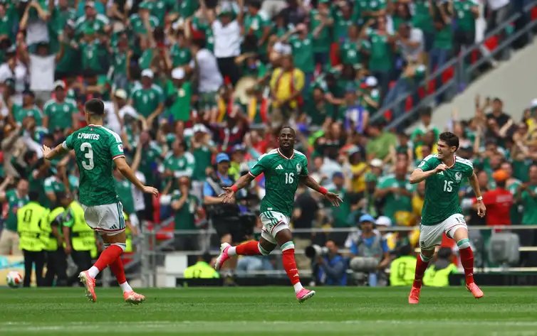 Soccer Football - FIFA World Cup 2026 - Group A - Mexico v South Africa - Estadio Azteca, Mexico City, Mexico - June 11, 2026 Mexico's Julian Quinones celebrates scoring their first goal with Israel Reyes and Cesar Montes REUTERS/Hannah Mckay