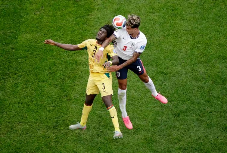 Soccer Football - FIFA World Cup 2026 - Group L - England v Ghana - Boston Stadium, Foxborough, Massachusetts, U.S. - June 23, 2026 Ghana's Caleb Yirenkyi in action with England's Nico O'Reilly REUTERS/Pilar Olivares